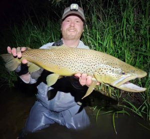 Brown trout caught with Northern Rivers Outfitters on the Pere Marquette river. Fly Fishing trout trips. Guided hex hatch trips pere marquette